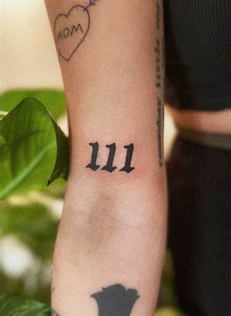 Angel numbers tattoo 111